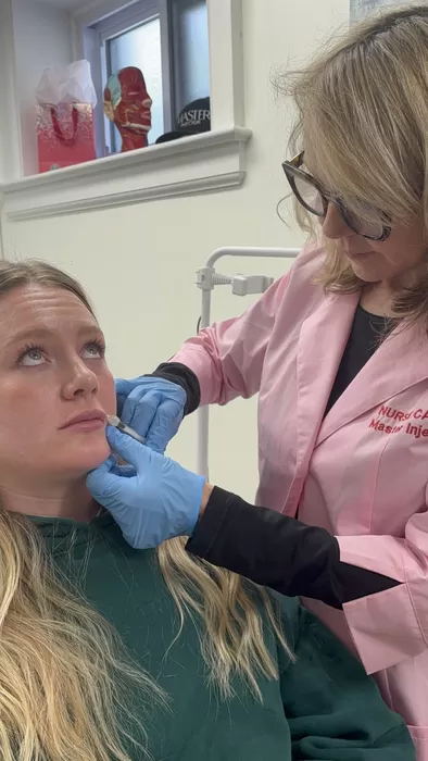 Nurse Cathy Douglas treating the cheek area