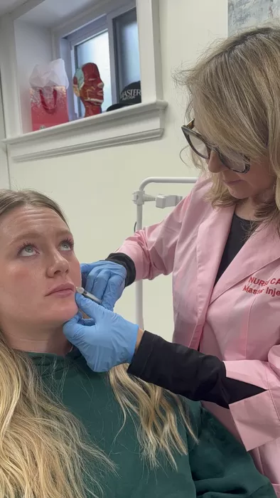Nurse Cathy Douglas during facial restoration