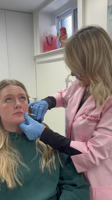 Nurse Cathy Douglas treating the mid-face