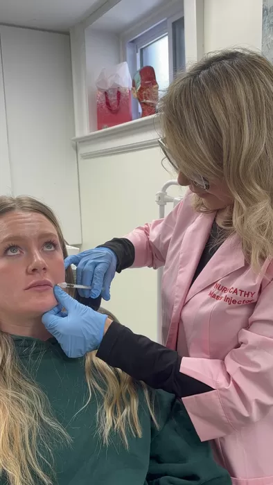 Nurse Cathy Douglas treating the under-eye area